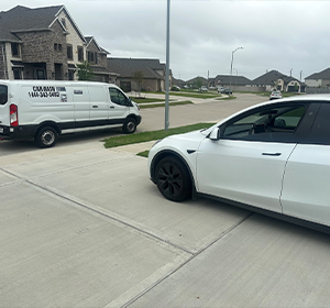 TONY'S ELITE MOBILE DETAILING expert washing black car