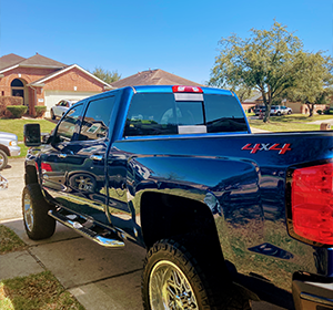 TONY'S ELITE MOBILE DETAILING expert cleaning & polishing red car’s exterior